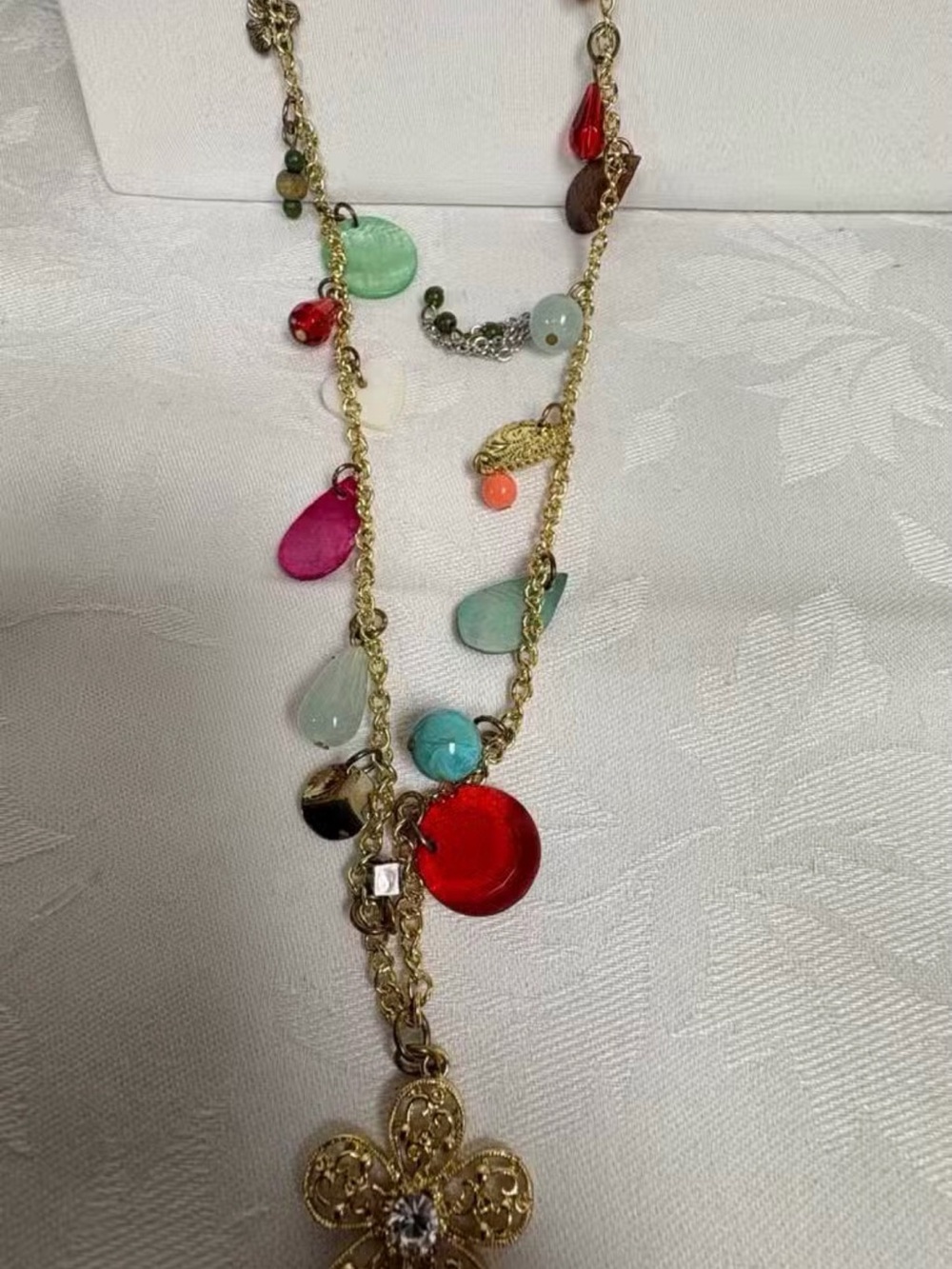 Candie's Gold-Tone Multi Charm Necklace with Red and Teal Accents